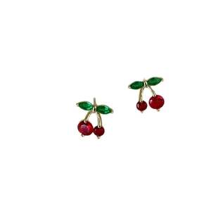 Cute cherry stud earrings with red faceted stones and green crystal leaves on gold stems