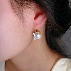 Elegant gold hoop earrings with snowflake zircon tassels and white pearl charms