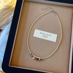 Colorful Czech bead necklace with diverse resin pendants and silver lobster clasp