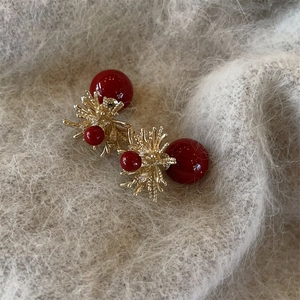 Retro deep red pearl earrings with golden fireworks design and crystal accents