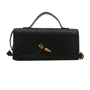 Sac à main élégant en cuir tressé noir avec fermoir noeud doré et poignée supérieure