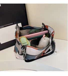 Interior view of large tote bag showing capacity for tablet, umbrella and essentials
