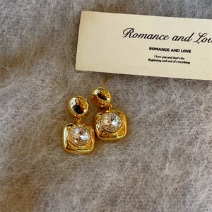 Minimalist square crystal stud earrings with polished gold geometric drop design