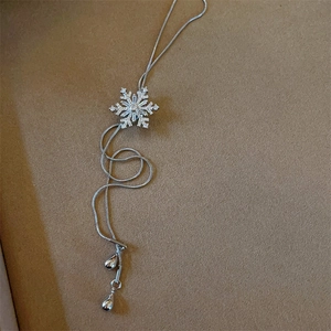 Elegant silver snowflake necklace with adjustable snake chain and sparkling zircons