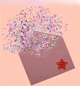 Colorful star moon heart sequins pouring out of pink envelope for gift party decoration