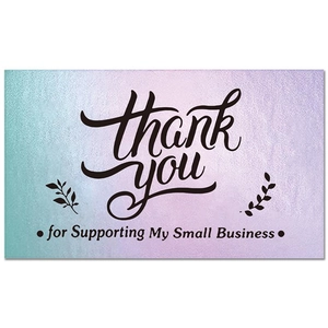 Flat lay of holographic thank you card with lavender gradient and floral details