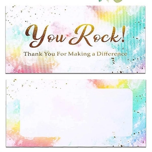 Macro detail showing double-sided colorful reward cards with golden You Rock lettering