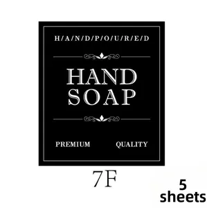Close-up of waterproof minimalist black hand soap labels with premium white text lettering