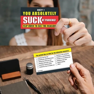 Close-up of funny parking violation cards with clear checkboxes for bad parking reasons