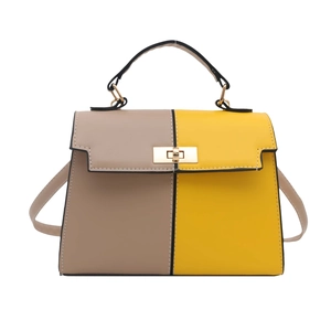 Two-tone Kelly style handbag in camel and yellow with metal turn-lock and top handle