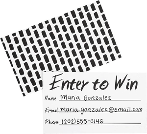 Detail view of blank raffle tickets with Enter to Win header and contact info fields
