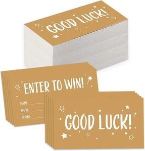 Detailed view of gold raffle tickets with Good Luck text and entry information fields