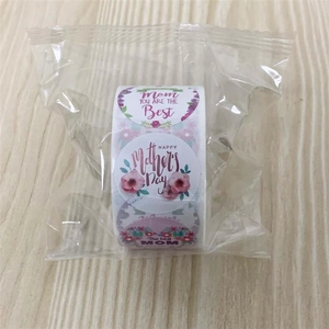 Detail of floral Mother's Day roll stickers with 'Mom you are the best' greeting text