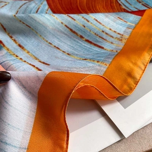 Silk-like shawl scarf with wave illustration patterns and orange blue gradient colors
