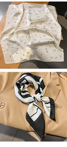 Detail showing elegant printed silk scarves with bird patterns and geometric stripes