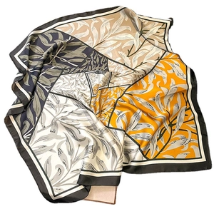 Elegant floral print silk-feel square scarf with yellow and green leaf pattern design