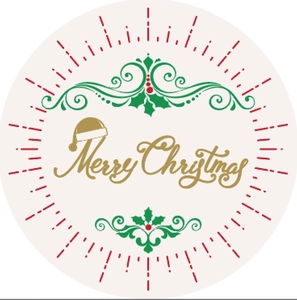 Detail of round Merry Christmas sticker with gold script and green holly leaf patterns