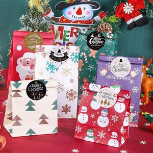Detailed view of Christmas gift bags with Santa patterns and Merry Christmas seal stickers