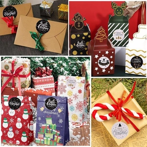 Christmas roll stickers featuring deer and trees applied on gift boxes and envelopes