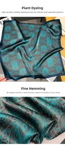 Detail of paisley silk scarf featuring natural plant dyeing and fine hemmed edges