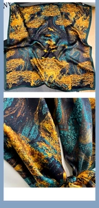 Macro detail of vintage silk scarf showing artistic gold and navy blue oil painting texture