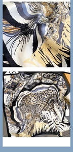 Detailed view of leopard print silk scarf showing artistic floral patterns and soft texture