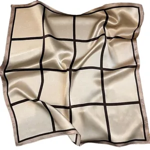 Champagne gold silk square scarf featuring minimalist dark brown checkered pattern design