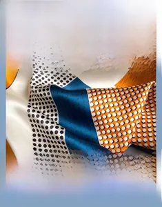 Detailed view of 65cm silk scarf with geometric orange and navy patterns and dot texture
