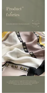 Macro detail of silk-satin scarf fabric showing smooth texture and geometric pattern