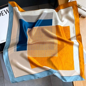 65cm silk square scarf featuring geometric color-block patterns and polka dot design