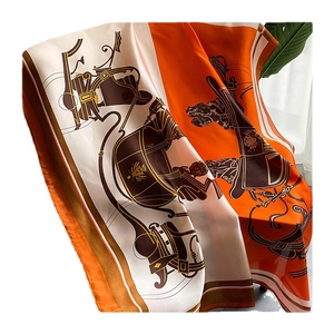 Elegant long silk satin scarf featuring vintage horse carriage pattern in orange and brown