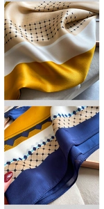 Close-up of luxury silk scarf showing smooth satin texture and geometric diamond pattern