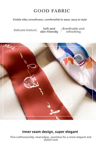 Close-up of printed silk scarf showing fine inner stitching and smooth satin texture