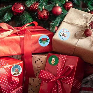 Festive round Christmas stickers with Santa designs on gift boxes with tree background