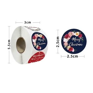 Roll of 500 Merry Christmas stickers with snowflake wreath designs for holiday gift wrapping