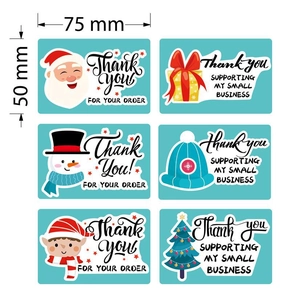 Detail view of six 75x50mm Christmas gift labels featuring Santa and winter illustrations