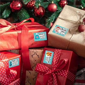 Christmas thank you stickers for packaging with festive trees and hats on gift boxes