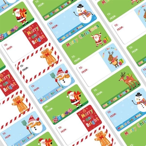 Macro detail of red Christmas gift seal stickers with Santa and reindeer designs
