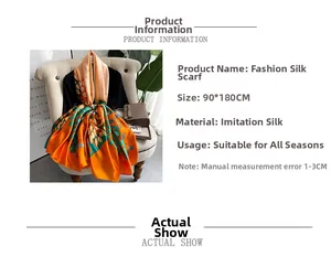 Detail of 90x180cm faux silk scarf with vibrant orange and green leaf print design