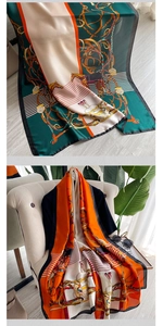 Detail of silk-like horse chain scarf with equestrian print for versatile styling