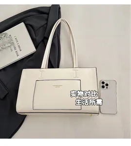 Detailed size comparison of a minimalist cream tote bag next to a smartphone