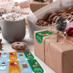 Autocollants de Noël assortis pour boîtes cadeaux avec motifs Père Noël et rennes