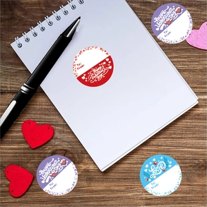 Valentine's Day heart round gift stickers with To-From fields on wooden background