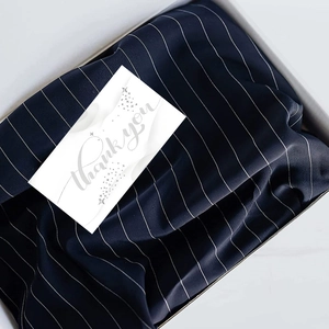 Elegant navy blue silk scarf with white stripes in a premium white gift box with card