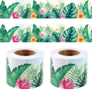 Close-up of tropical palm leaves and hibiscus flower patterns on decorative bulletin board border