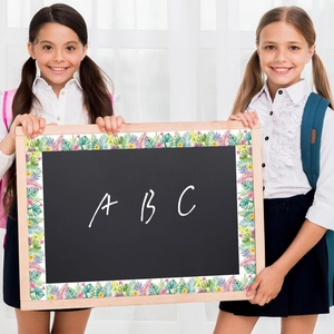 Tropical floral bulletin board border stickers with school girls holding a chalkboard