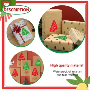 Macro shot of waterproof Christmas tree stickers for holiday gift wrap and card sealing