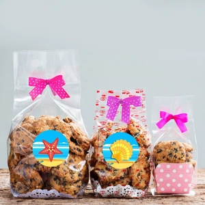 Trois tailles de sachets biscuits avec stickers mer et nœuds à pois sur bois