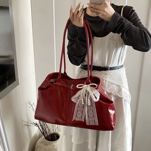 Large red oil wax leather tote bag with white lace bow charm for casual office commuting