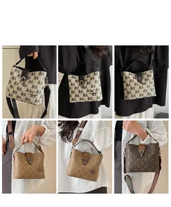 Multiple views of a vintage bucket bag with monogram print and wide crossbody strap
